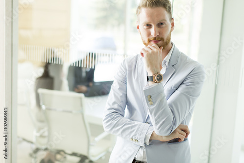 Modern young businessman in...