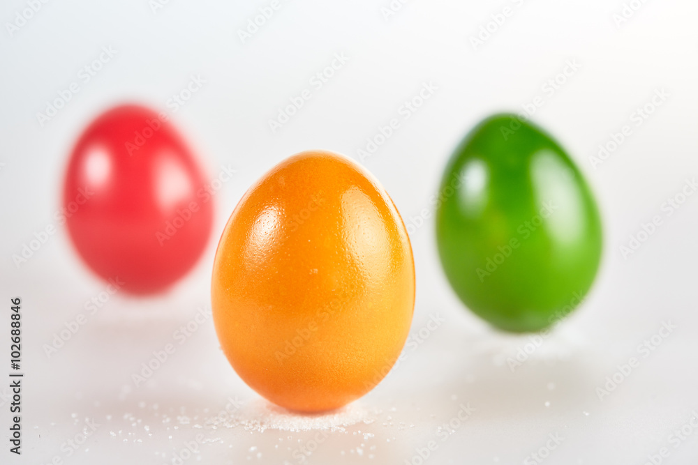 Three colored easter eggs on white background Three colored easter eggs on white background