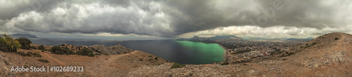 panorama, horizontal view of Crimean mountains with rocky coastline, Black sea before the rain, storm © MySunnyday