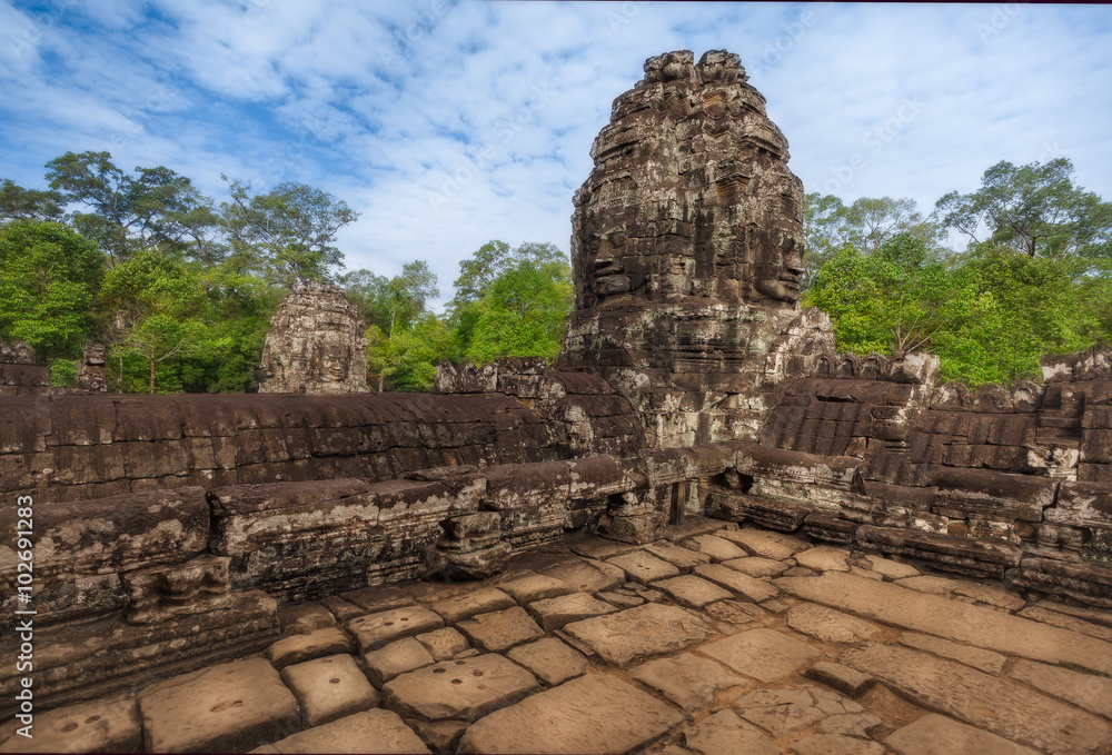  SIEM REAP, CAMBODIA.  The ruins of Bayon Temple with many stone faces, Angkor Historical Park.