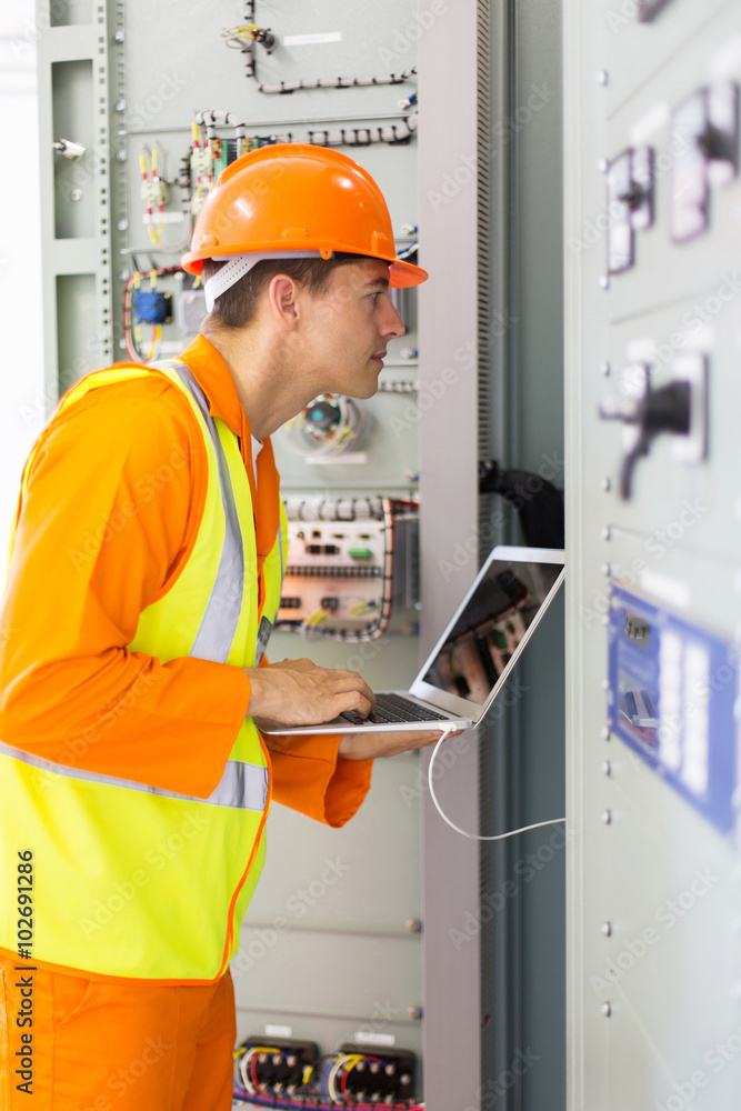 industrial technician checking transformer industrial technician checking transformer