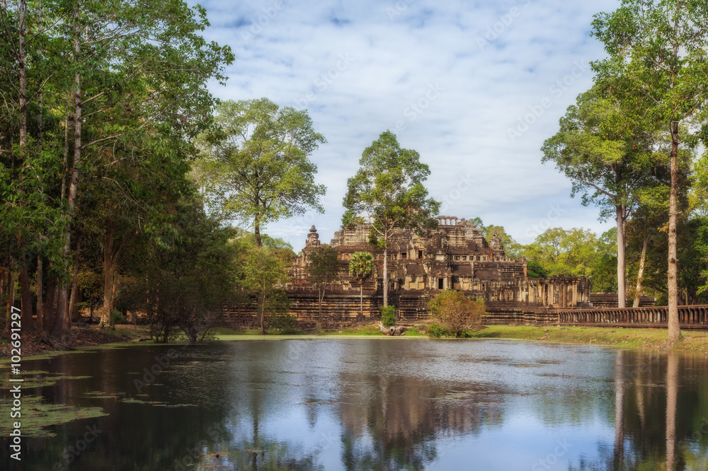 SIEM REAP, CAMBODIA. The ruins of Bayon Temple with many stone faces, Angkor Historical Park. SIEM REAP, CAMBODIA. The ruins of Bayon Temple with many stone faces, Angkor Historical Park.