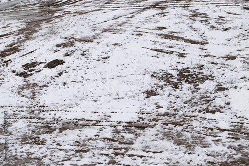 dirty frozen ground