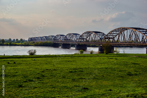 Arched, steel road bridge over the River Vistula in Grudziadz in Poland.