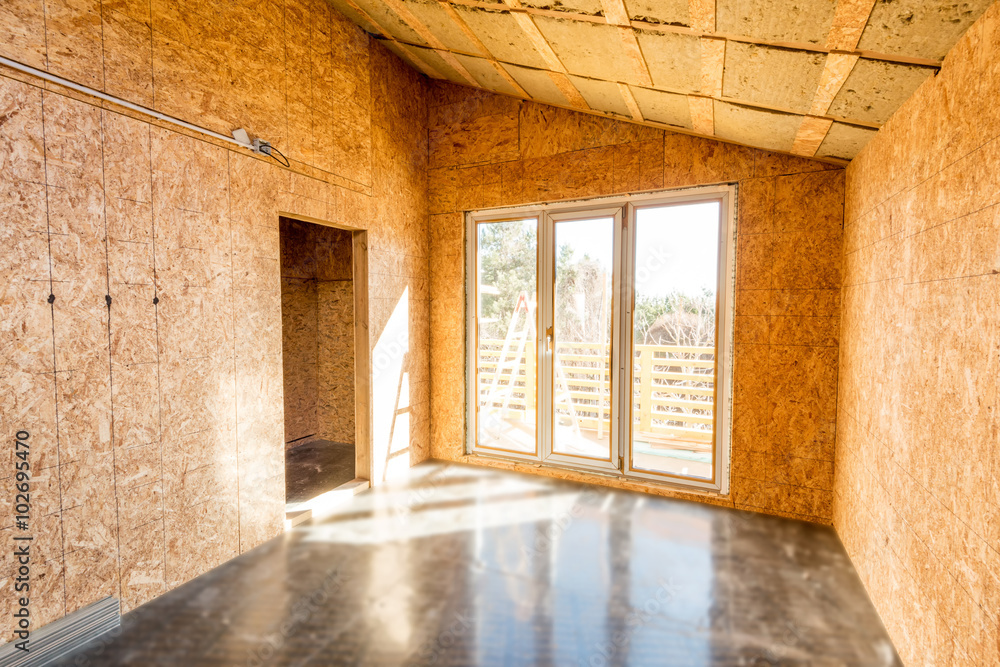 Wooden frame of a new house under construction Wooden frame of a new house under construction