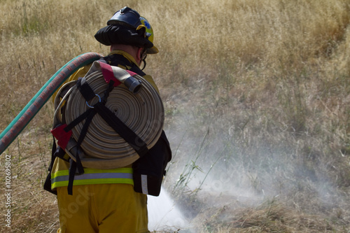 Wildland Firefighter fighting grass fire