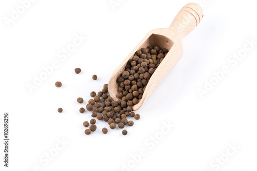 Wooden shovel with black peppercorn