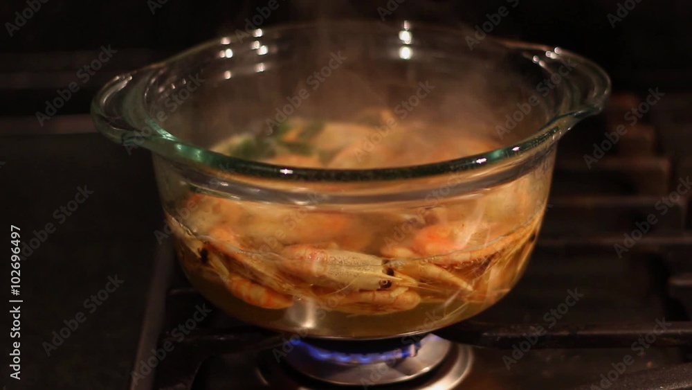 cooking srimps in transparent glass pot cooking srimps in transparent glass pot