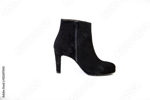 Suede women's boots on a white background, black shoes, autumn and winter, side view