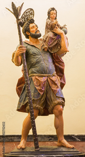 Seville - The statue of st. Christopher in baroque Church of El Salvador