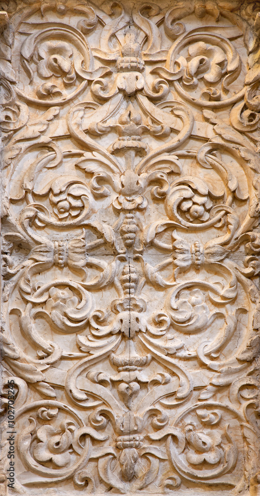 Granada - baroque stone decoration relief in church Monasterio de la Cartuja.