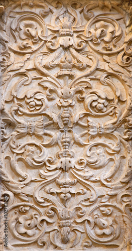 Granada - baroque stone decoration relief in church Monasterio de la Cartuja.