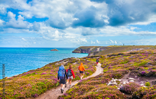 Obraz na płótnie Tourists hiking at Cap Frehel, Bretagne, France w salonie