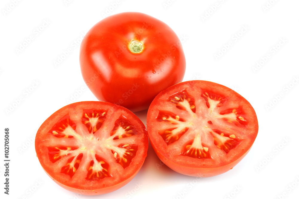 fresh whole tomato and half cut tomato on white background fresh whole tomato and half cut tomato on white background