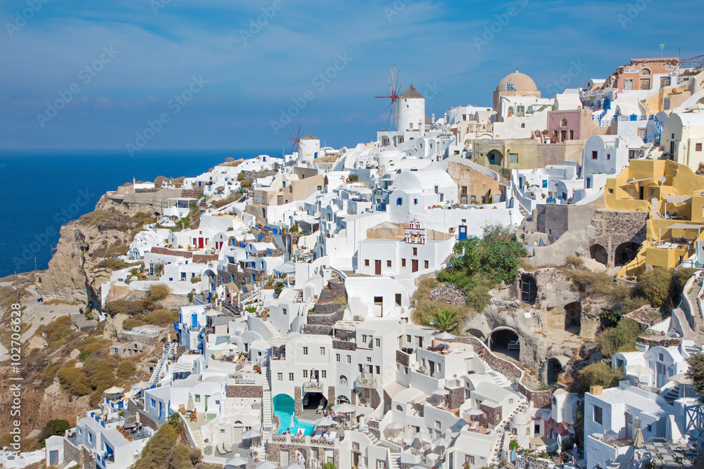 Santorini - The look to part of Oia with the windmills and luxury resorts.