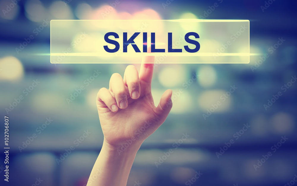 Skills concept with hand pressing a button Skills concept with hand pressing a button