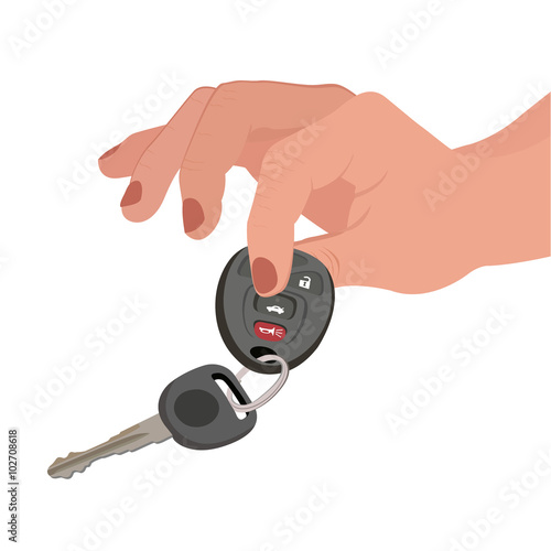 Hand holding car key and remote entry fob isolated on white background