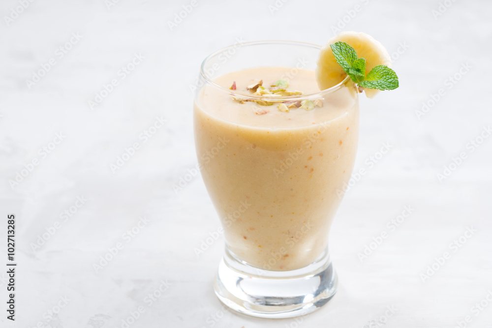 banana smoothie in a glass banana smoothie in a glass