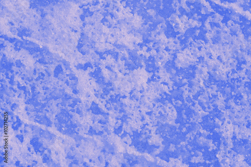 Синий лед кристально ледяной поверхности. Макро крупным планом кристаллов льда.

