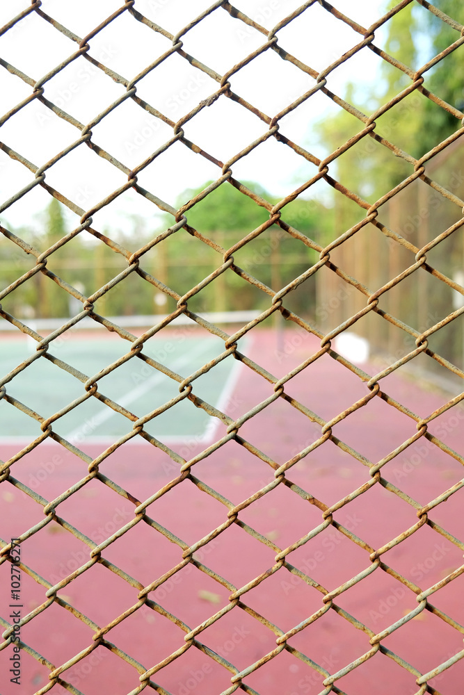 cage of blurred tennis court cage of blurred tennis court