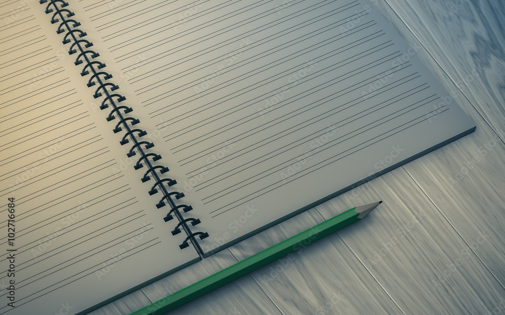 pencil on checked notebook on wood background pencil on checked notebook on wood background