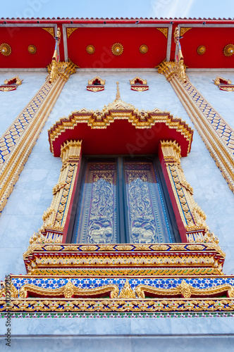 Thai style buddhism temple golden window