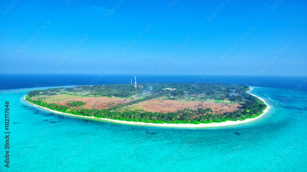 Beautiful tropical island from above. Maldives, whole island Tho