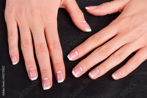 Women s hands with a stylish manicure.