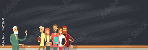 Student Group Over Blackboard With Professor, University Lecturer