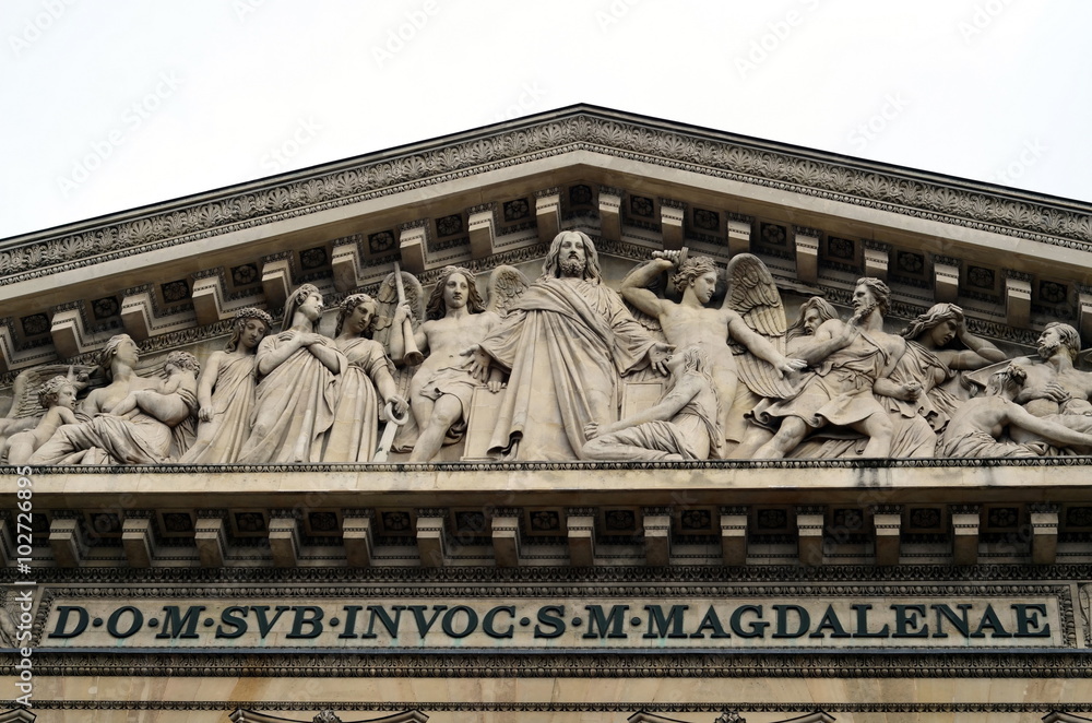 Fototapeta premium Bas-relief on the facade of the Church of Madeleine (St. Mary Magdalene) in Paris, France