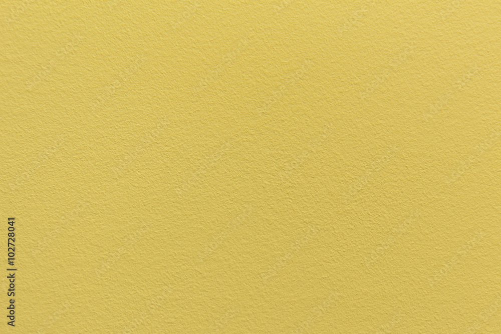Wall painted in yellow texture Wall painted in yellow texture