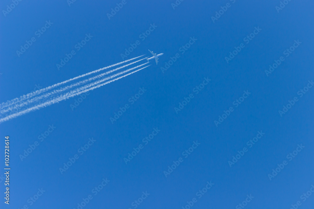 Airplane on the sky.Airplane flying across the sky Airplane on the sky.Airplane flying across the sky