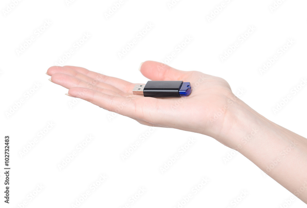 Woman hand holding a flash drive isolated on white background Woman hand holding a flash drive isolated on white background