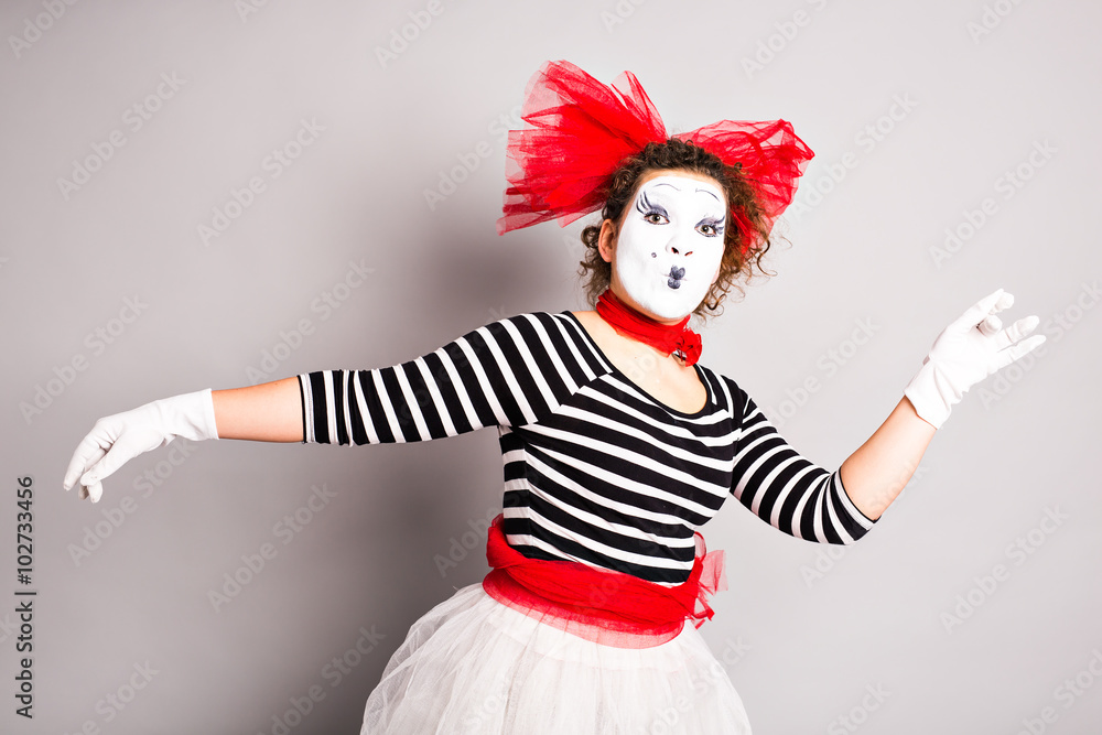 Portrait of a dancing woman mime, april fools day concept Portrait of a dancing woman mime, april fools day concept