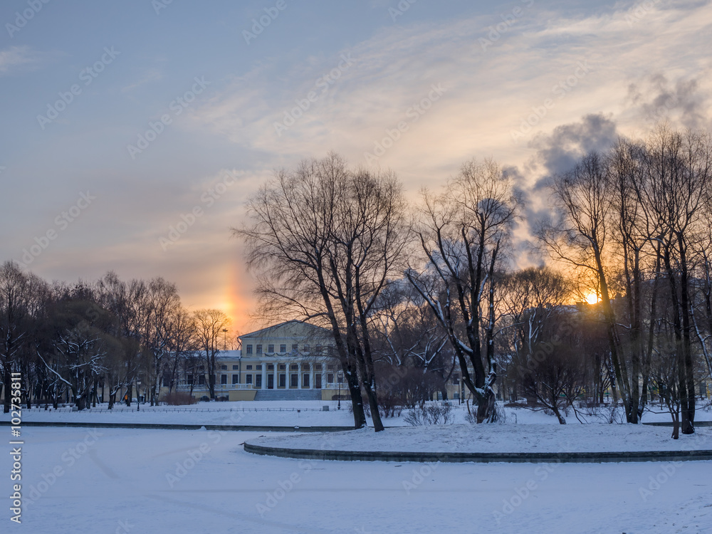 St. Petersburg in the winter. The Yusupov Palace on the Fontanka in the frosty sunny morning - view from the Yusupov Park. Sunny parhelion - frosty rainbow St. Petersburg in the winter. The Yusupov Palace on the Fontanka in the frosty sunny morning - view from the Yusupov Park. Sunny parhelion - frosty rainbow