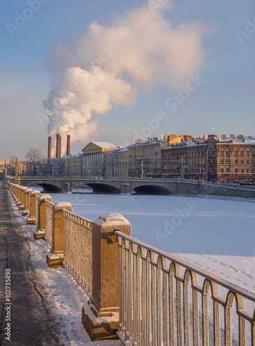 St. Petersburg in the winter. Frozen River Fontanka and architecture on its banks,  Izmaylovsky Bridge © Igor Gorshkov