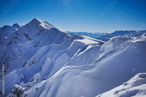 Winter mountains panorama with ski slopes. Caucasus