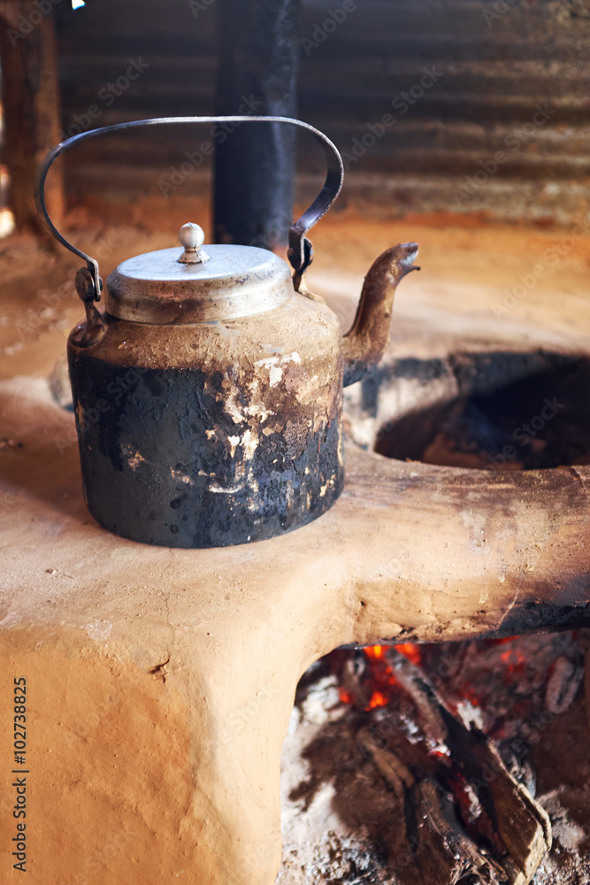 Traditional preparation of tea on clay oven Nepal Traditional preparation of tea on clay oven Nepal