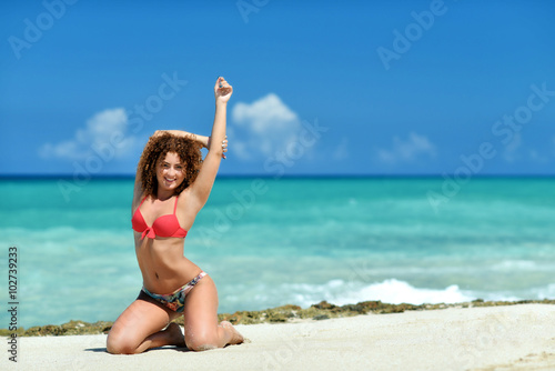 A cruly girl on the beach