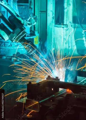 Welding robots movement in a car factory
