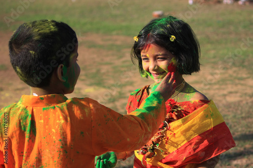 Children are enjoying Holi, the color festival of India.   The festival of color at Shantiniketan, the abode of Rabindranath Tagore.