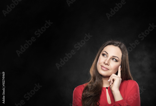 Woman pondering over something. 