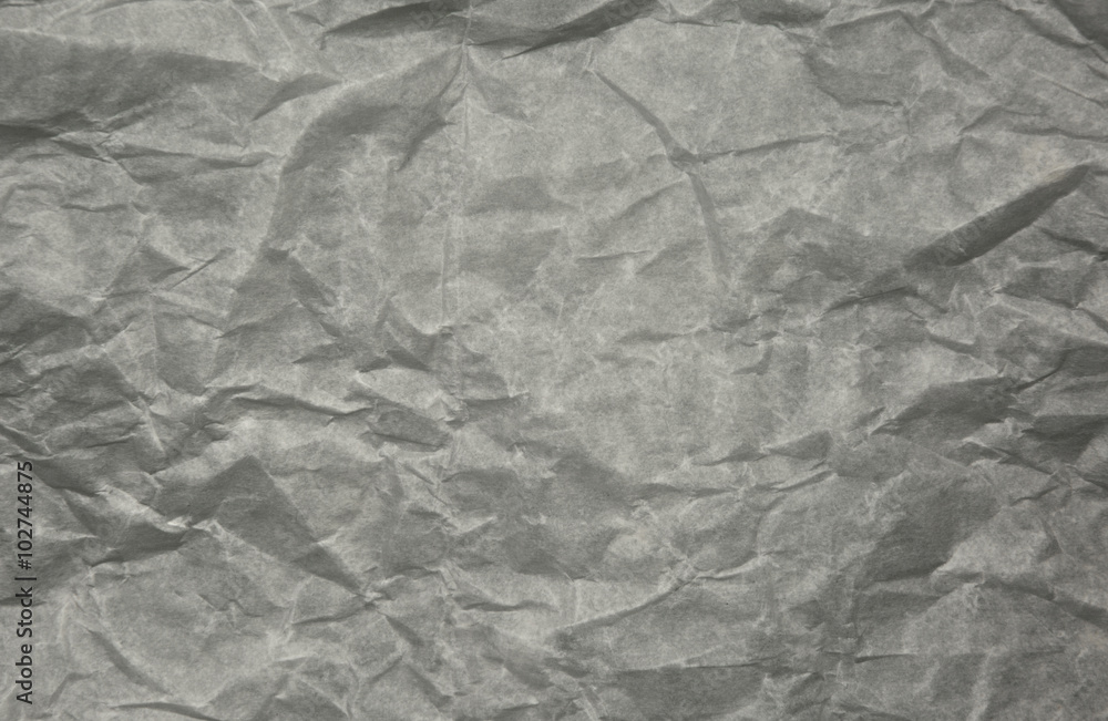 Fototapeta premium Crumpled sheet of parchment, interesting background