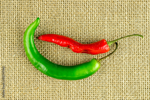 Red spicy pepper and large green chili photo