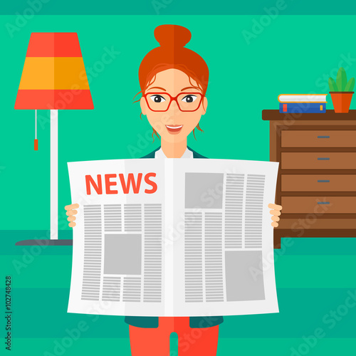 Reporter reading newspaper.
