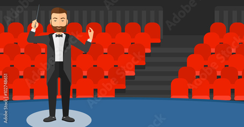 Conductor directing with baton.