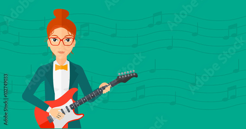 Musician playing electric guitar.