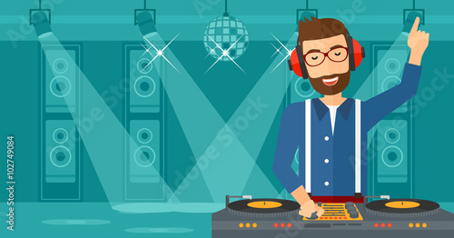 Smiling DJ with console.