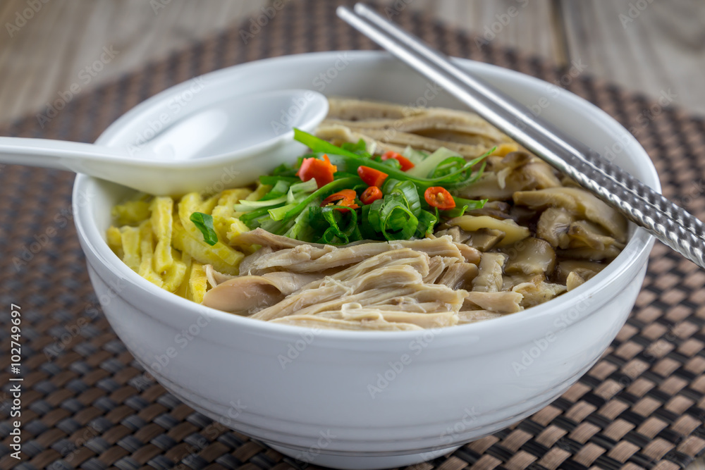 Vietnamese vermicelli with egg, pork, chicken and shiitake mushroom in