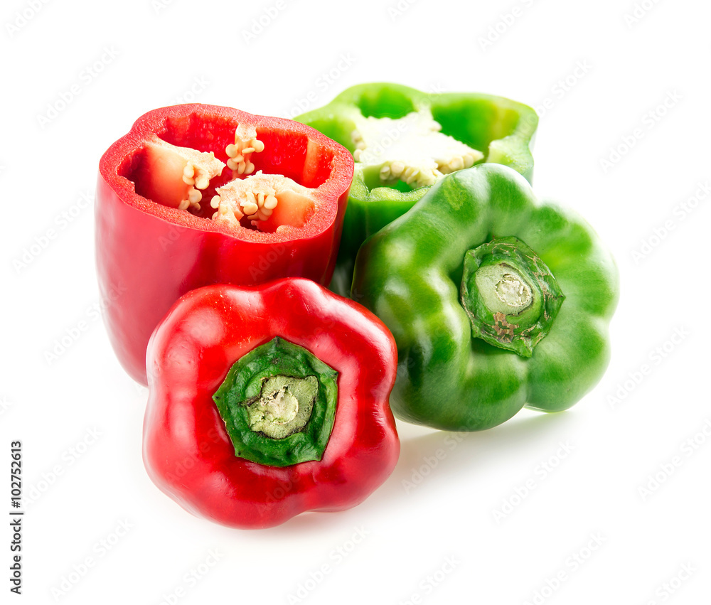 Bright red and green flavorful capsicums with tops removed Bright red and green flavorful capsicums with tops removed